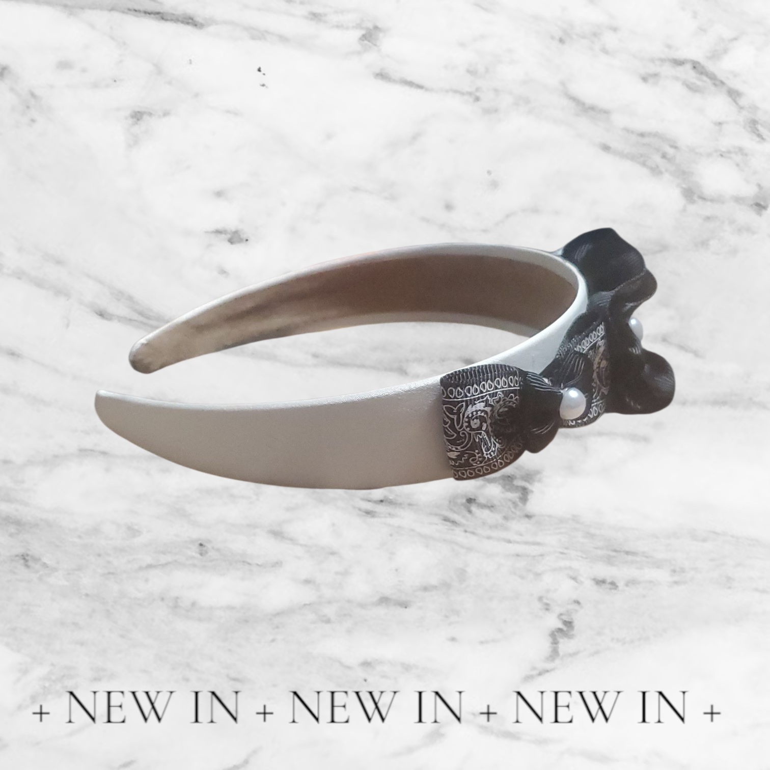 Elegant silver and black headpiece!