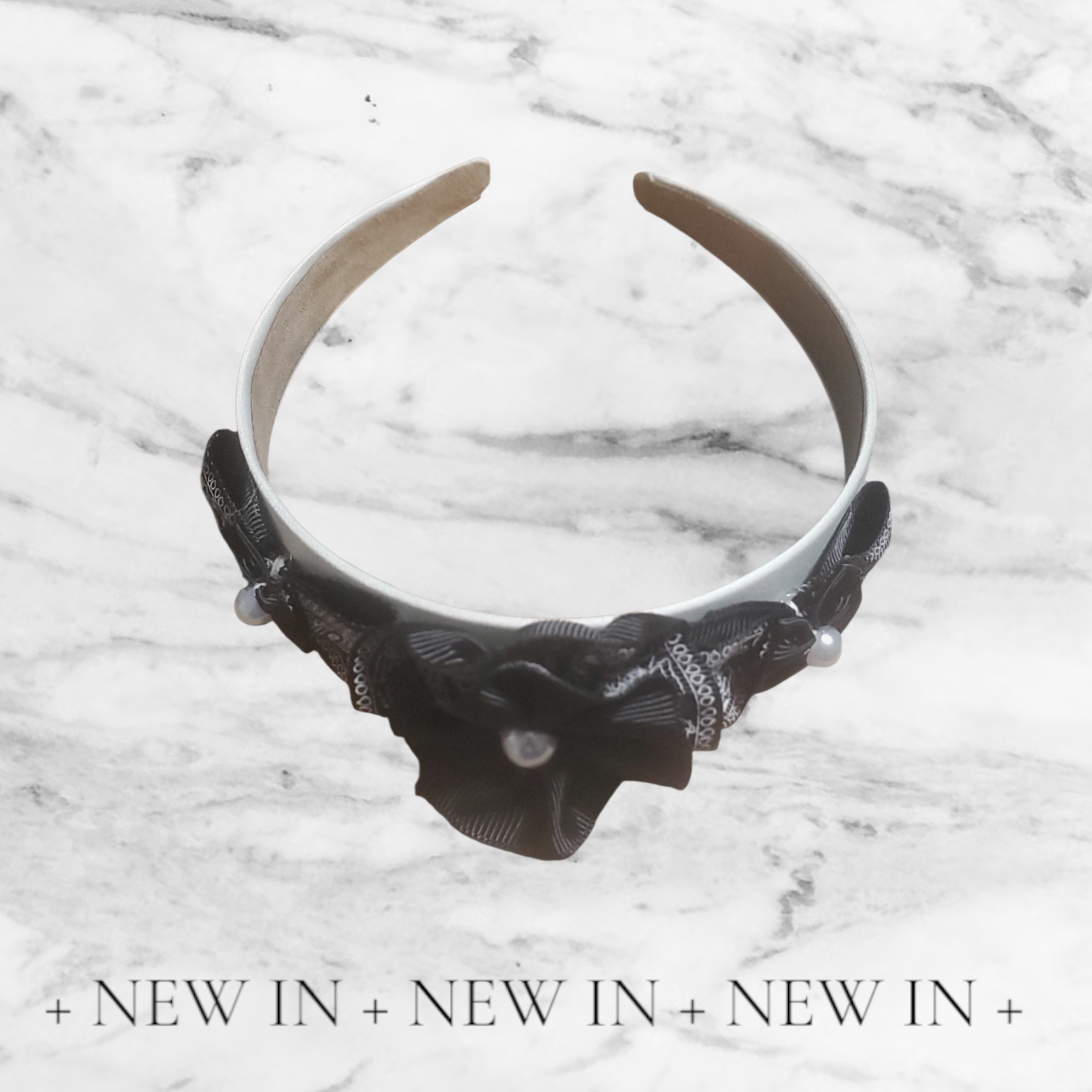 Elegant silver and black headpiece!